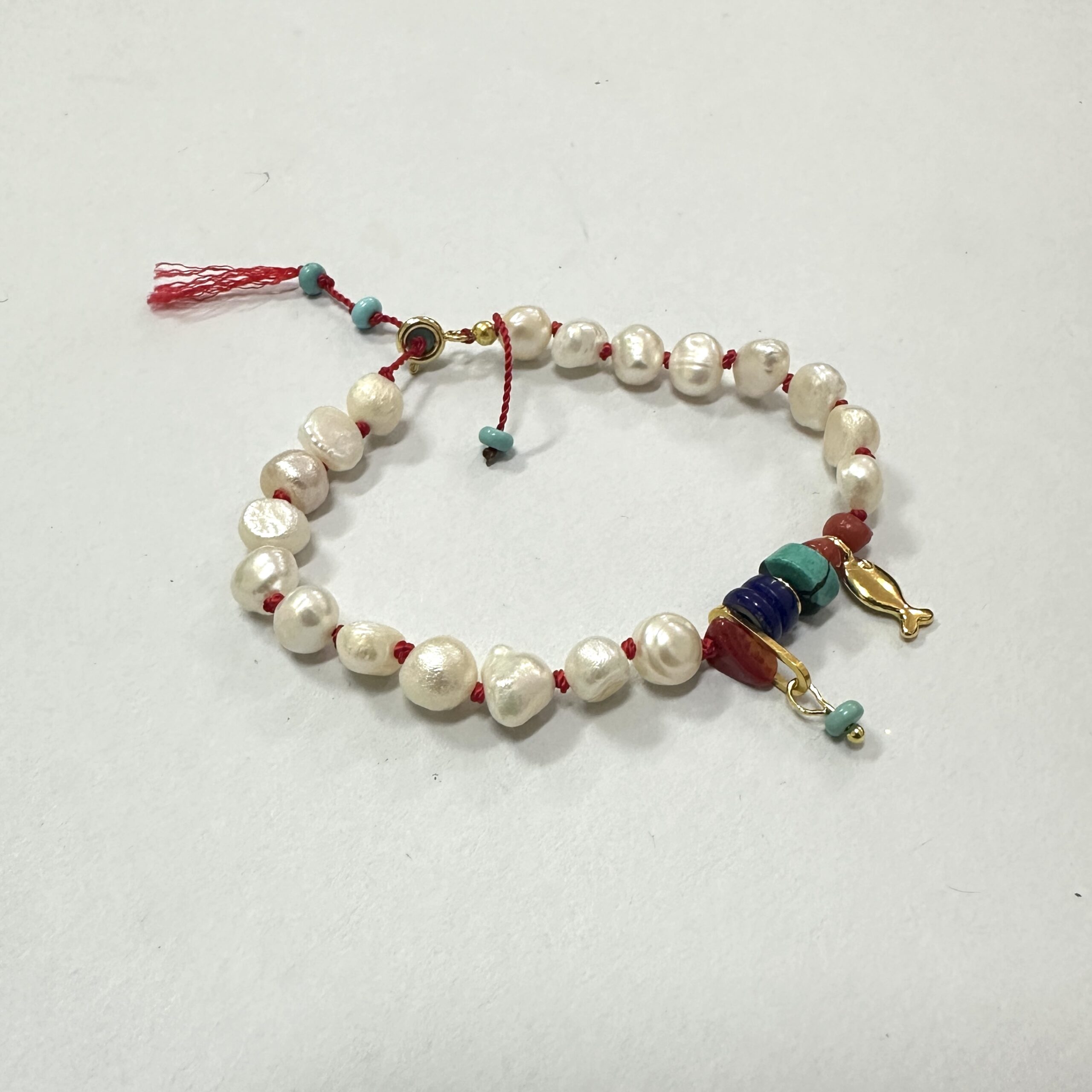 Pearl Charm Bracelet on Knotted Red Silk