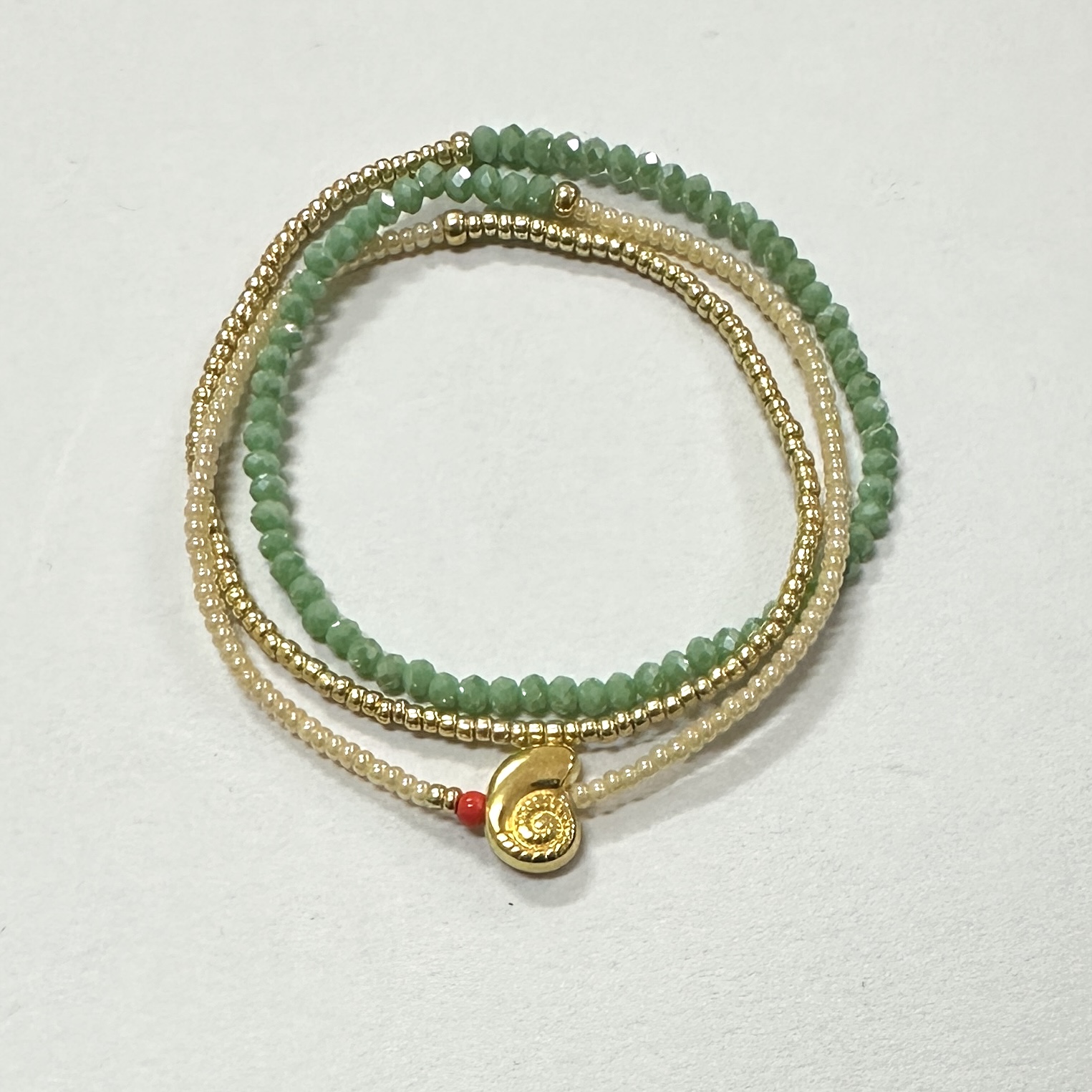Beaded Triple Wrap Bracelet in Aqua and Gold with an Ammonite Charm