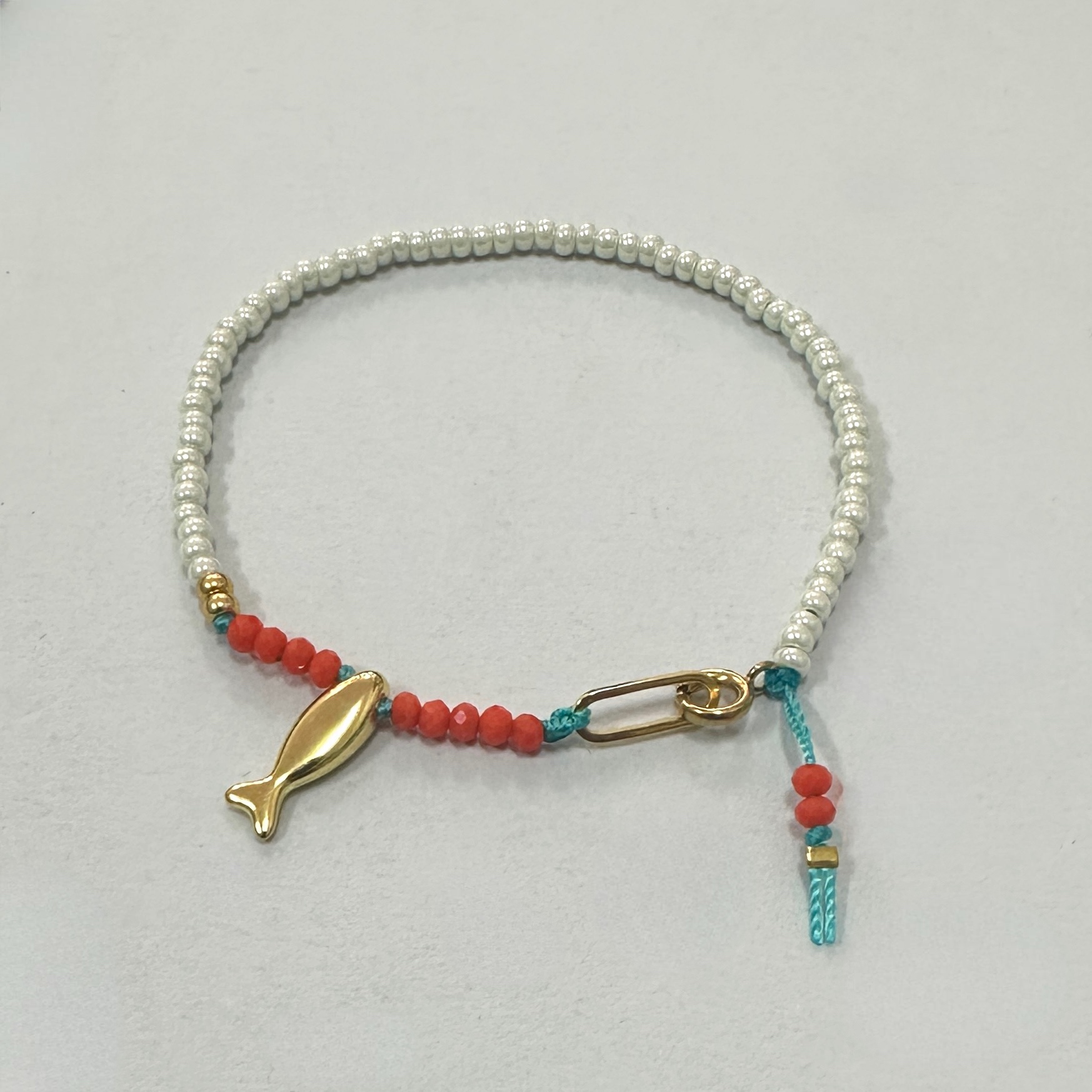 Pearly White and Coral Red Beaded Bracelet with Gold Fish Charm