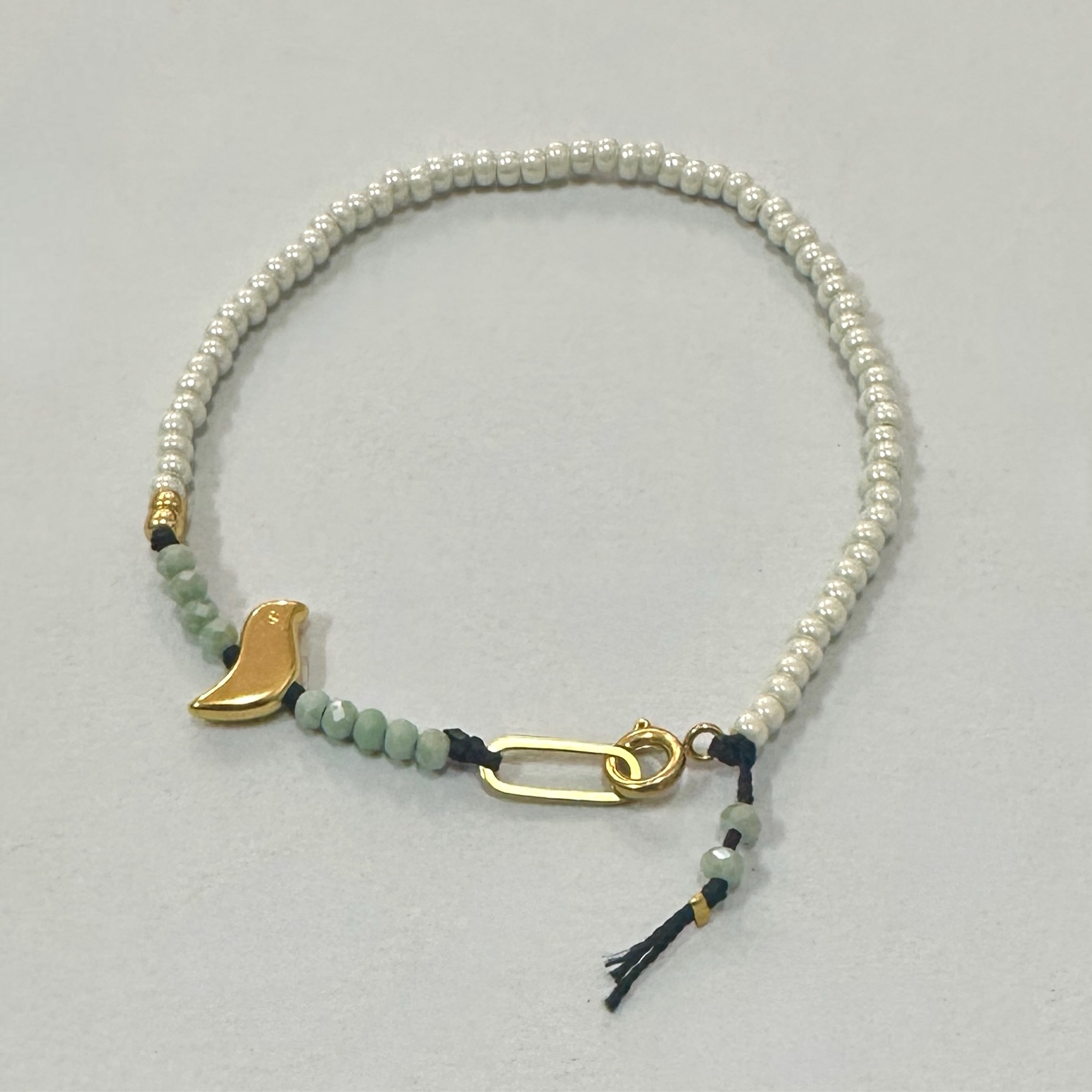 Pearly White and Aqua Blue Beaded Bracelet with Gold Bird Charm